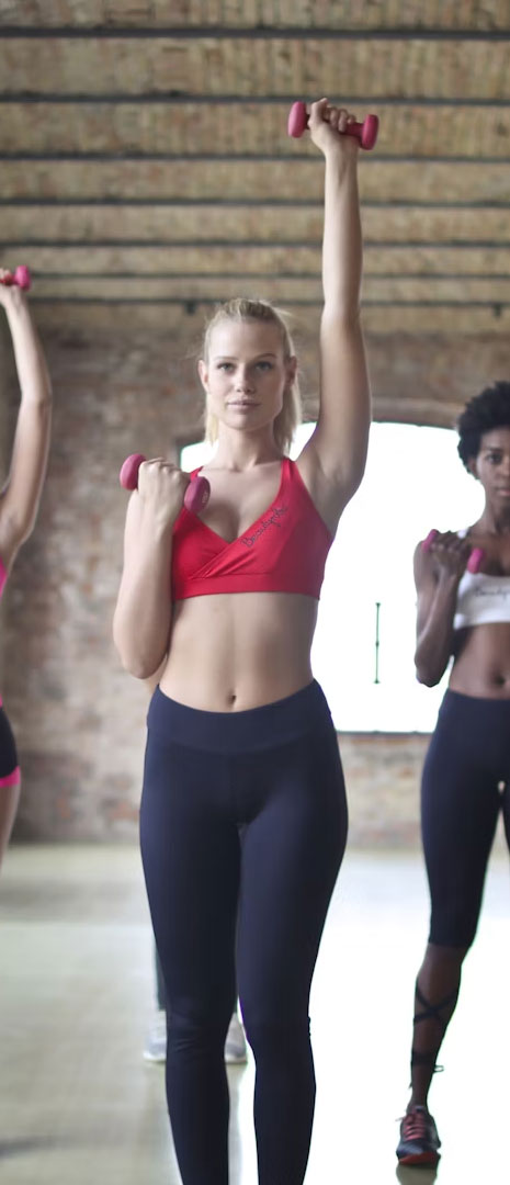 Two women exercising.